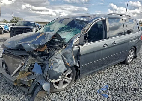 2010 Honda Odyssey Touring z USA, uszkodzony, nr VIN 5FNRL3H96AB055932